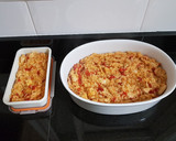 Foto del paso 6 de la receta: Arroz caldoso con pollo, tomate y pimientos rojos