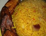 A picture of step 6 of Red party jollof wit plantain(signature Maggi seasoning).