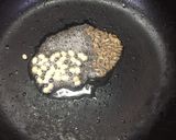 A picture of step 1 of Moringa Idly fry.