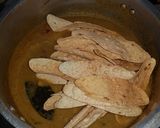 A picture of step 7 of Dhal papad curry.