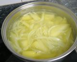 Foto del paso 2 de la receta: Alcachofas con almejas y patatas