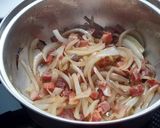 Foto del paso 5 de la receta: Cinta de lomo adobada, en airfryer, con guarnición de guisantes con jamón