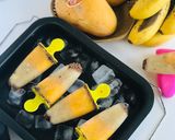 A picture of step 3 of Banana Mango Popsicles.