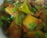 A picture of step 10 of Aloo & Shimla Mirch.