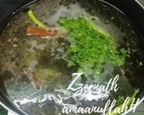 A picture of step 1 of Hyderabadi Kachchi Aqhni Chicken Dum Biryani.