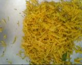 A picture of step 2 of Papaya sambharo.