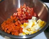 A picture of step 2 of Avocado Tomato Tuna Egg Salad.