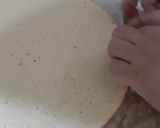 A picture of step 6 of Chocolate vanilla Swiss roll in fry pan.