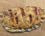 Foto del passaggio 9 della ricetta Calzone ripieno di coste indiavolate