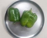 A picture of step 1 of Bell pepper / Shimla mirch ki besan wali sabji.