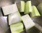 A picture of step 1 of Lauki / Dudhi Halwa.