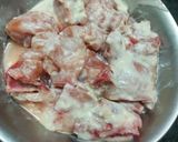 A picture of step 1 of Lonka Roshun Pora Masala Chicken.
