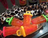 A picture of step 6 of Tangy Orange popsicles.