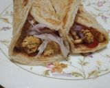 A picture of step 3 of Chicken Pratha Roll.
