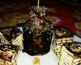 A picture of step 9 of Mariegold biscuit ka cake.