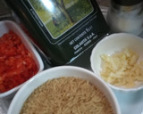 Foto del paso 1 de la receta: Arroz integral con ajo y locote rojo