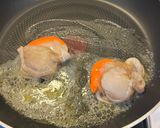 A picture of step 1 of Pan-Seared Scallops with Broccoli Rabe and Saffron Cream.