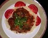 A picture of step 8 of Meatballs in pizzaiola sauce.