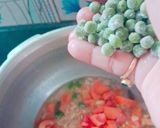 A picture of step 2 of Frozen peas tomato pulav.