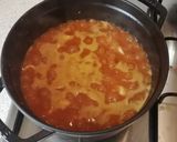 A picture of step 4 of Brothy rice with prawns and squid.