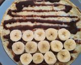 A picture of step 3 of Nuttela Crepes recipe.