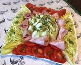 Une image de l'étape 11 de Salade d'endives tomates et courgette râpée à la mortadelle.