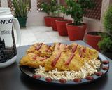A picture of step 3 of Besan Chilla with tofu paneer stuffing.