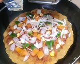 चीझी थालीपीठ पिझ्झा (cheese thalipeeth pizza recipe in marathi) रेसिपी स्टेप 3 फोटो 