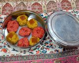 A picture of step 14 of Kaju ki burfi (cherries 🍒 and rose flavour) and laddoo (pan flavour).