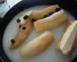 Foto del paso 1 de la receta: Plátanos maduros en leche y pasas de uva...🤔🍌🍇🍯🍶🥛🍯🍌