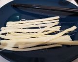 Une image de l'étape 3 de Tamagoyaki (omelette japonaise sucrée).