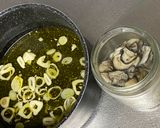 A picture of step 4 of Oyster pickled in Garlic Olive Oil.