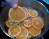 Foto del paso 3 de la receta Naranjas confitadas con chocolate