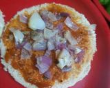 A picture of step 10 of Cheesy blast pizza delight.