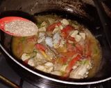 A picture of step 12 of Tikka chicken macroni.