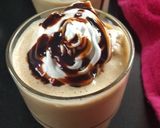 A picture of step 5 of Frothy coffee with ice cream.