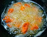 A picture of step 3 of Chicken 65.