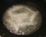A picture of step 2 of Alici Fritti Deep Fried Anchiovies.