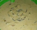 A picture of step 9 of Malpua with Rabri.