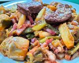Foto del paso 6 de la receta: Salteado de alcachofas con ajos tiernos, bacon y foie