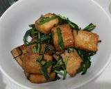 A picture of step 7 of Braised tofu with chives.