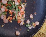 A picture of step 11 of My Saffron tumeric Rice with cod, prawns and veg.