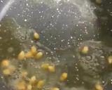 A picture of step 1 of Stove top salty buttery popcorn.