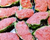 A picture of step 4 of Stuffed Bell Peppers in Sweet and Savory Sauce.