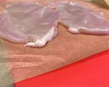 A picture of step 1 of Chicken Milanese.