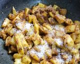 A picture of step 2 of Raw Mango Lonji.