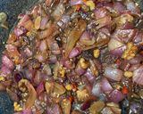 A picture of step 3 of Red onion chutney with nuts and raisins.