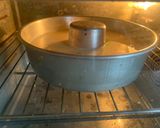 A picture of step 6 of Green Pudding with the hint of coconut powder and Pakola syrup.