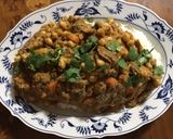 A picture of step 5 of California Farm Goat Confit with Garbanzo Beans.