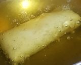 A picture of step 7 of Makki saag spring roll.